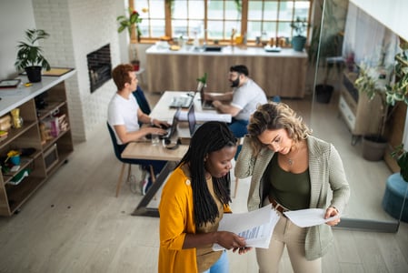 salespeople working to determine if their business has the right product-market fit for their industry